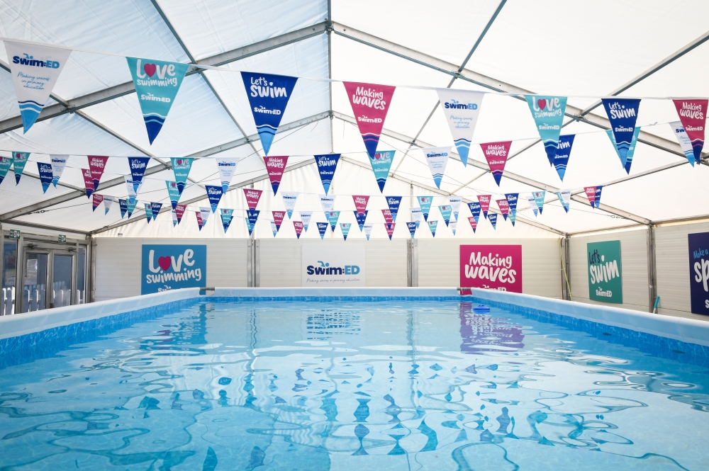 swimed-pool-signs-and-bunting-wide-shot-back-⭐️.jpg